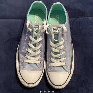 purple and teal converse low top sneakers